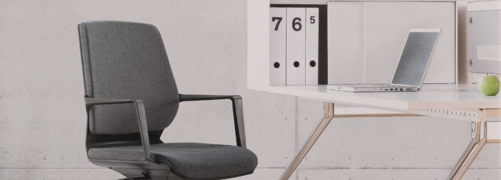 Gray Party task chair with armrests in a modern studio office setting.