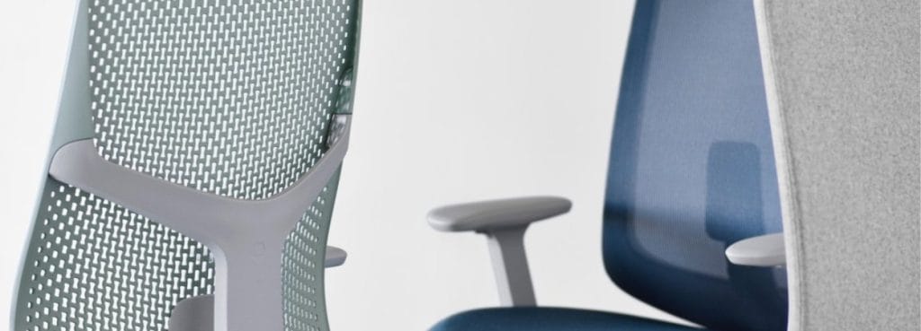 Verus chair with breathable mesh back in green and blue, ergonomic office seating.