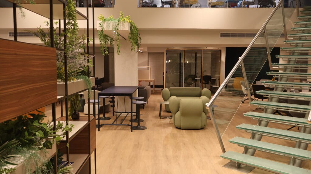 Nicosia studio office design with plants, furniture, and a staircase. IMG_2782.