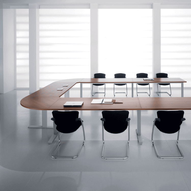Modern KOMPAS Meeting Table in wood finish with black chairs, ideal for collaborative meeting spaces.