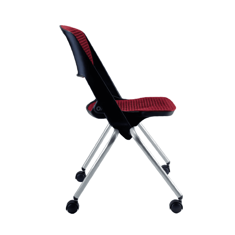 Side view of a Mobby chair. Black frame, red perforated seat and back, silver legs with wheels. Stackable seating for seminars.