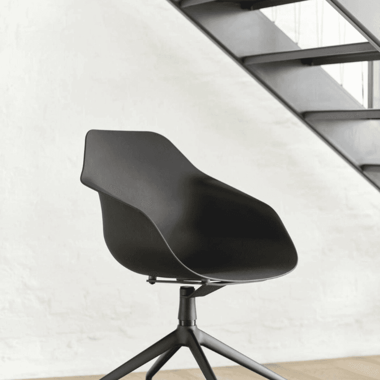 Modern black Yonda chair with ergonomic design for office, home, or meeting spaces.