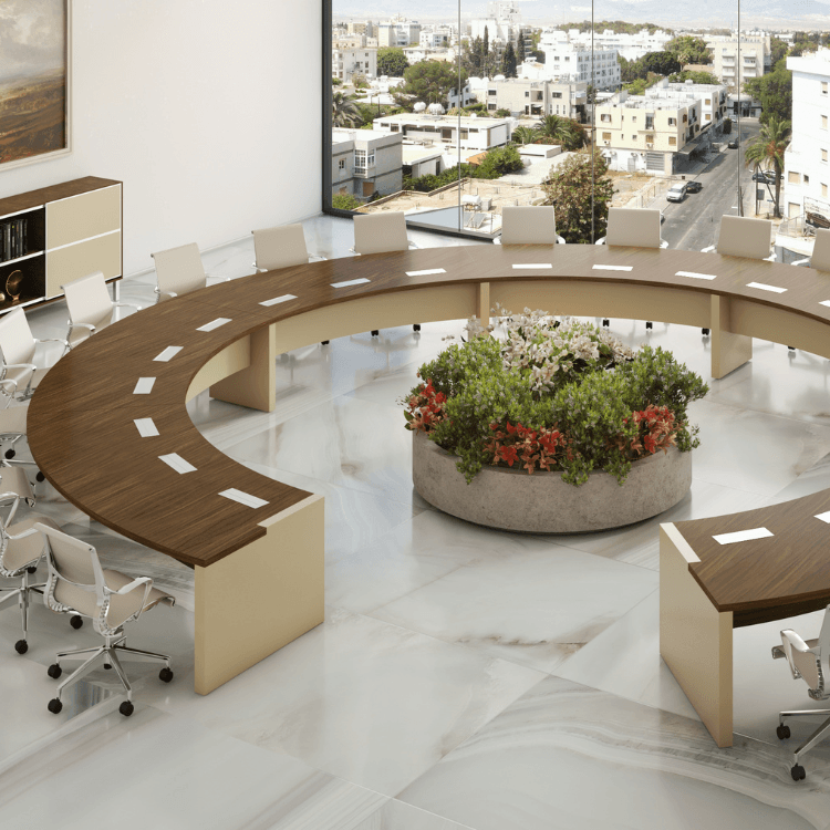 Modern Apollo Conference table in wood and beige, curved design with central flower arrangement.