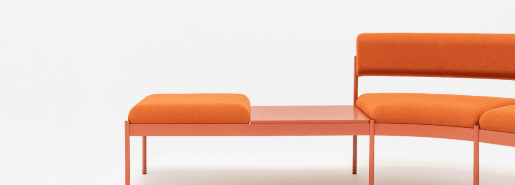 Modern orange Nora modular seating system for welcome areas.