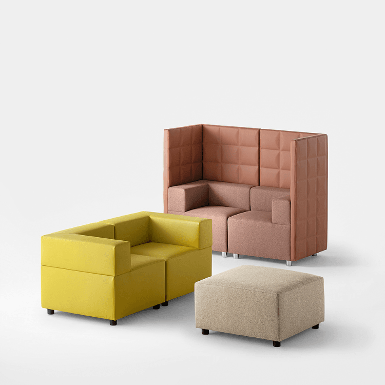 Kuadra modular seating: yellow armchair, ottoman, and high-back corner sofa in brown. Modern, customizable design.