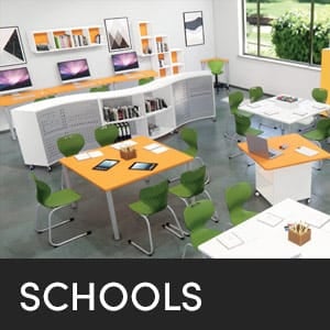 Modern school classroom design with desks, green chairs, computers, and shelving. Interior of Schools.