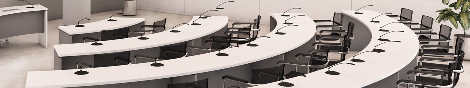 Cosmos PDF Series header image: Curved desks with microphones in a conference room.