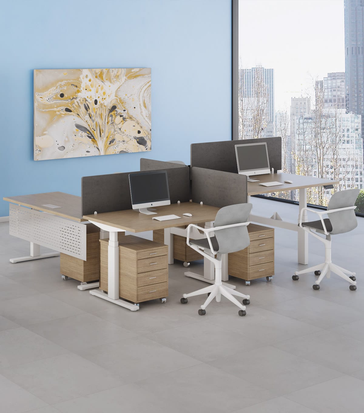 Studio Office Fly Series desks with screens, computers, rolling chairs, and storage cabinets.