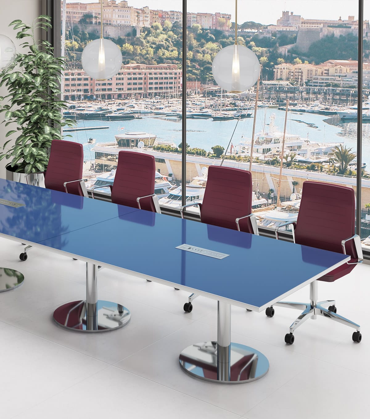 Studio Office Manager Series conference table with blue top and red chairs.