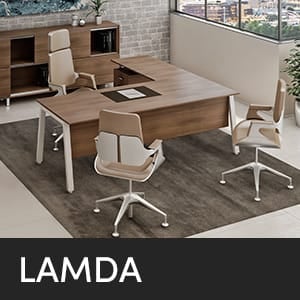 LAMDA studio office setup with a wooden desk and chairs in a modern interior.