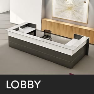 Studio office lobby featuring a modern reception desk with a white countertop and dark gray base.