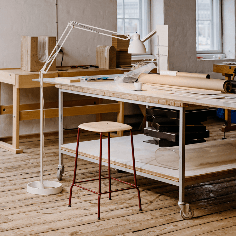 HAY Soft Edge 80 stool. Wood seat with red steel legs, minimalist design.