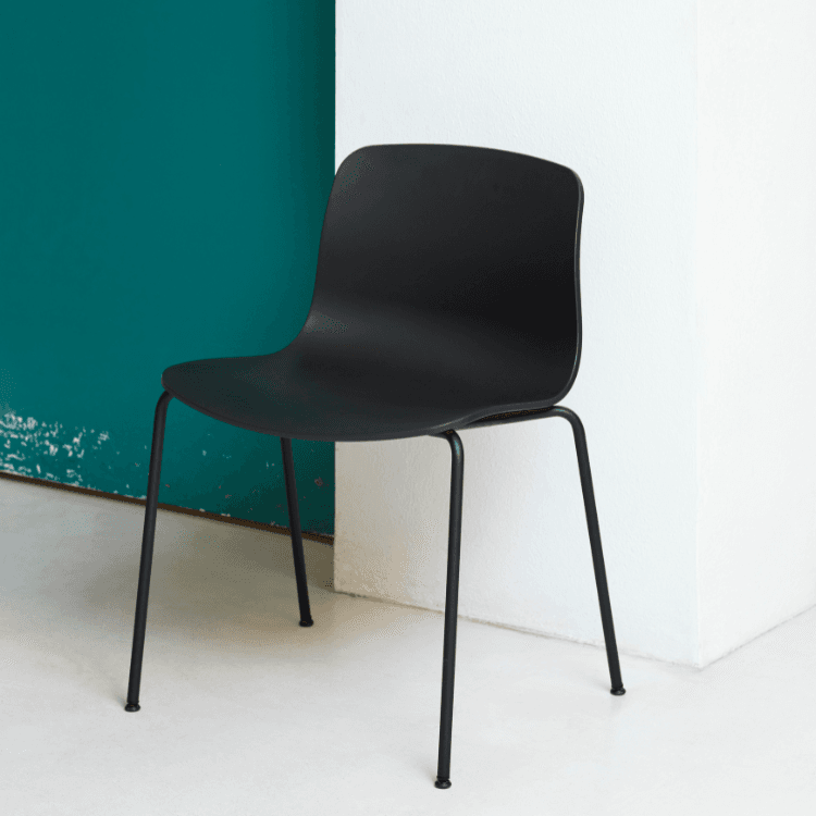 AAC 16 chair by HAY. Black recycled plastic shell with black steel legs. Minimalist design.