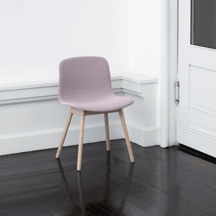 HAY AAC 13 chair. Pale pink fabric seat with light wood legs, modern style.