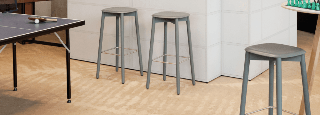 Modern grey Soft Edge 82 stool by HAY. Minimalist design with wooden frame, ideal for social spaces in Cyprus.