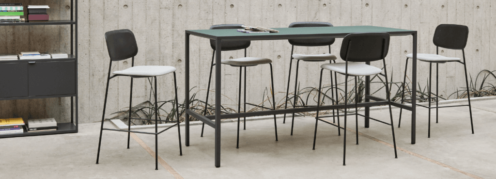 HAY Soft Edge 90 bar stools, minimalist design with steel legs and wooden seat/back.