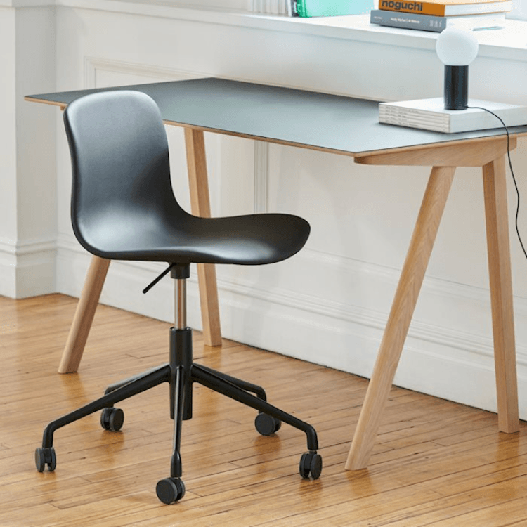 HAY AAC 51 task chair. Black shell, aluminum base with wheels. Modern office furniture.