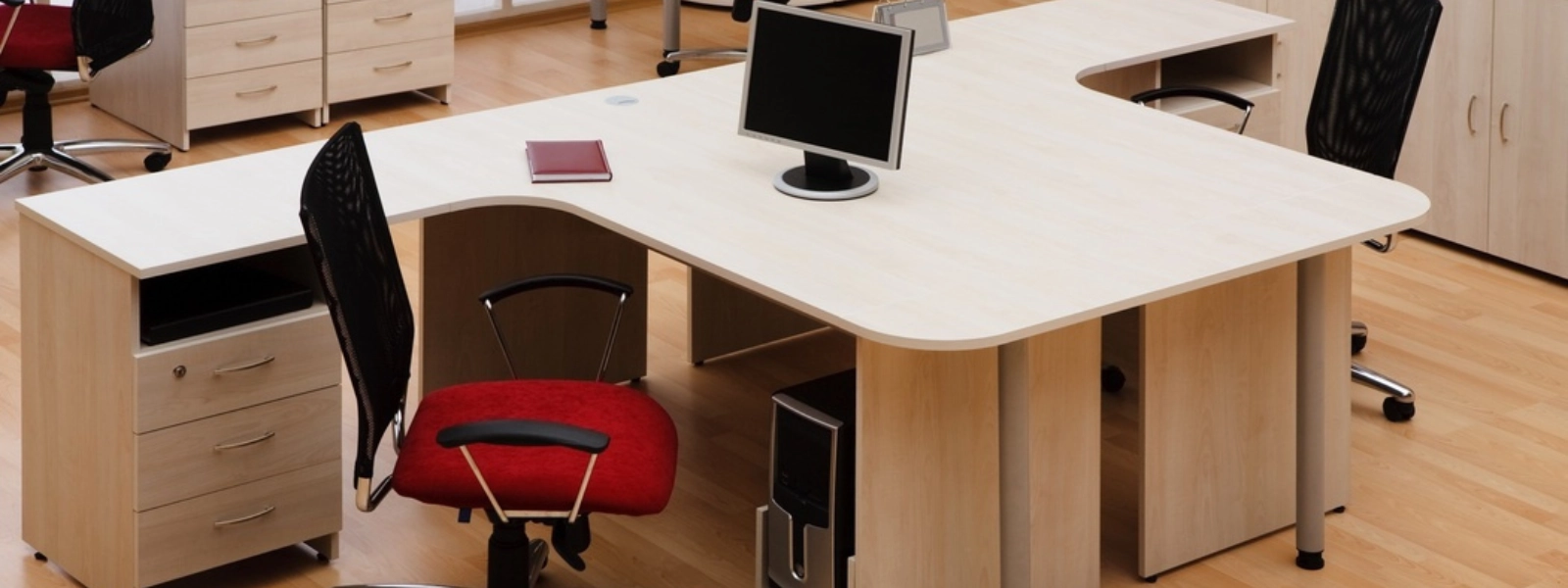 Ergonomic furniture featuring an adjustable desk and chair for comfort, health, and productivity in the workplace.