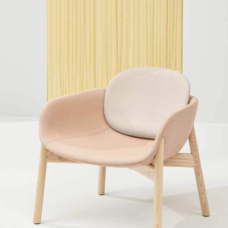 Peb lounge chair by Infiniti in a soft interior setting.