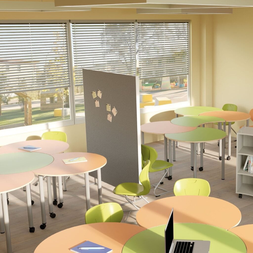 Mela apple-shaped tables grouped around round Cerchio tables