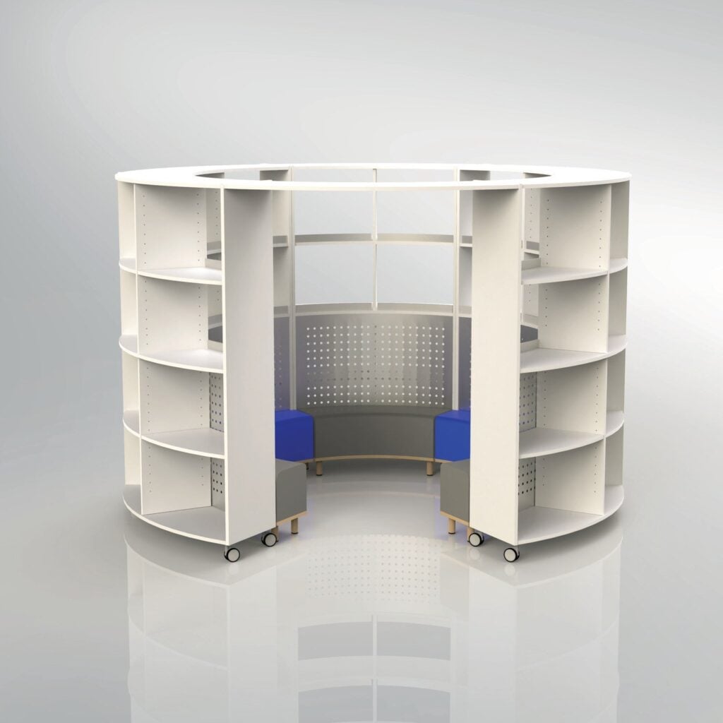 Tall curved bookcases around a reading corner