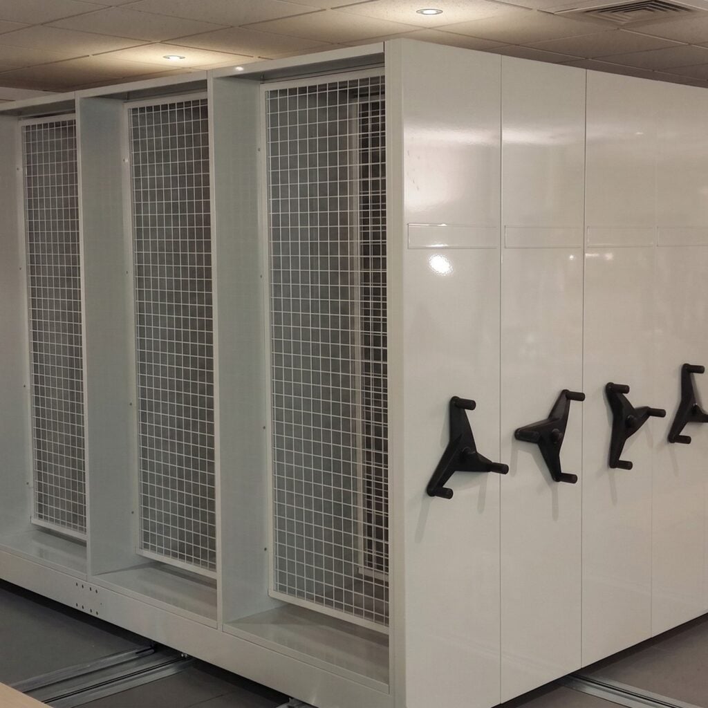 Closed white mobile filing cabinets with handwheels and mesh end doors