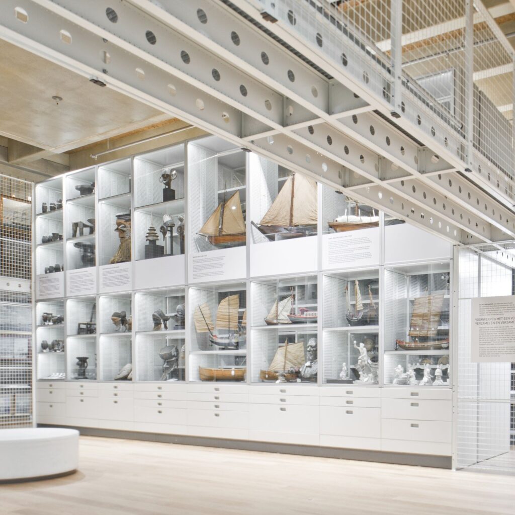 Museum store with white collection shelving and drawer units