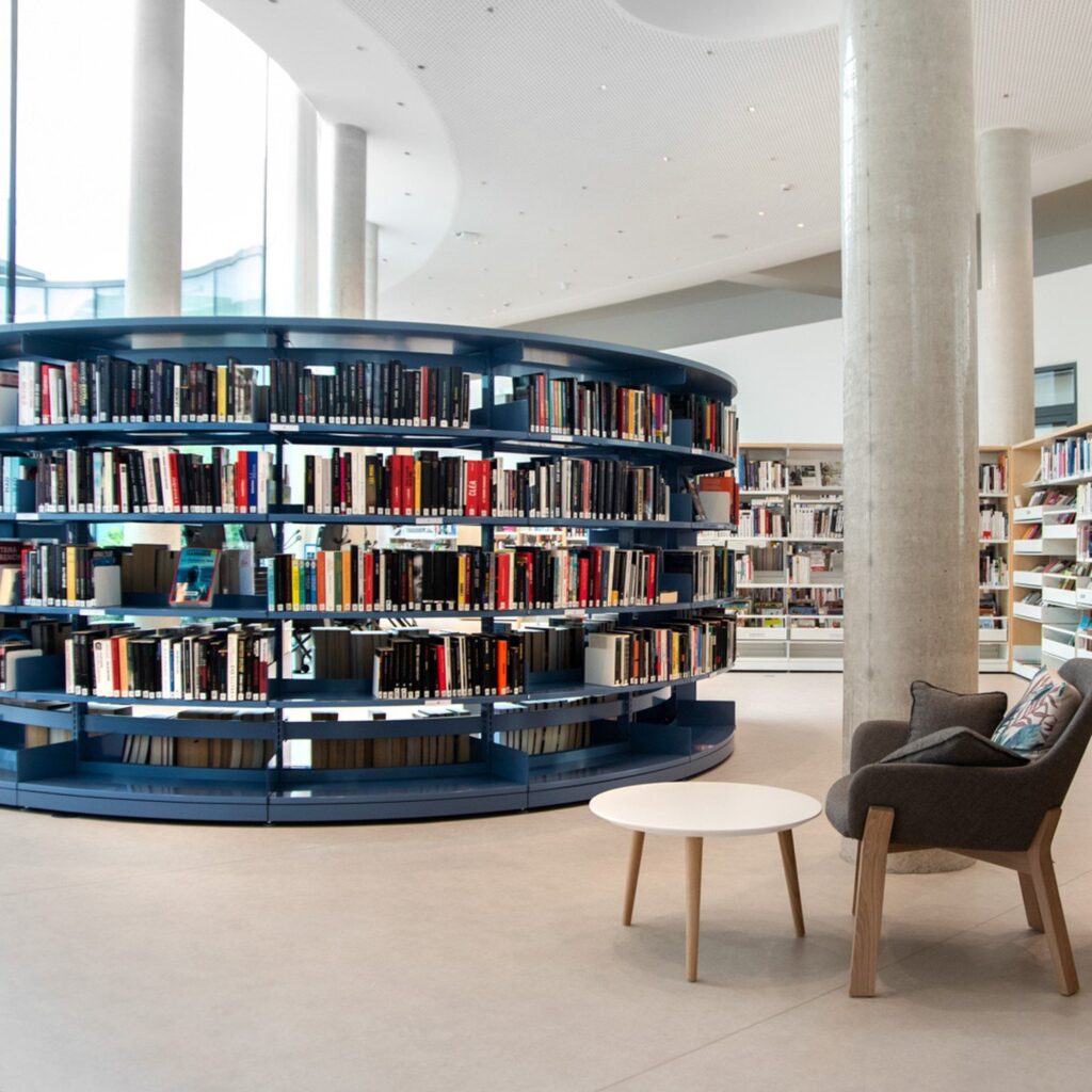 Blue round library shelving island